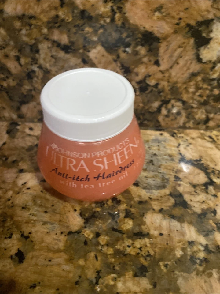 Aderezo para cabello ultra brillante anti picazón con aceite de árbol de té 2,25 onzas Foto 1 de 4