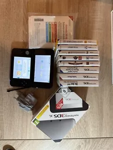 Nintendo 3DS XL silber/schwarz mit Ladekabel, Stift, OVP und Spielesammlung - Bild 1 von 11
