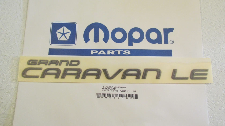 Nuevo OEM Gris Dodge "GRAND CARAVAN LE" Placa de identificación Emblema Letra Kit Insignia 0HS38PD8 Foto 1 de 1