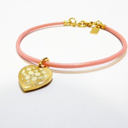 Bracciale COACH in vera pelle motivo cuore oro rosa