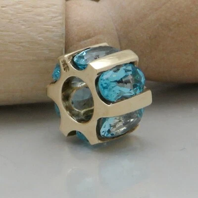 Anhänger Läufer mit Blautopas Besatz in 375/9K Gelbgold - Bild 1 von 4