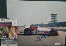 Signed A.j. Foyt INDY 500 8X10 photo w/ JSA COA