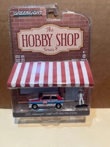 1/64 GREENLIGHT HOBBY SHOP 1975 VOLKSWAGEN RABBIT WITH RACE CAR DRIVER - Picture 1 of 3
