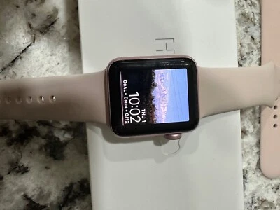 Reloj inteligente Apple Watch Series 2 38 mm caja de aluminio dorado rosa con arena rosa... Foto 1 de 4