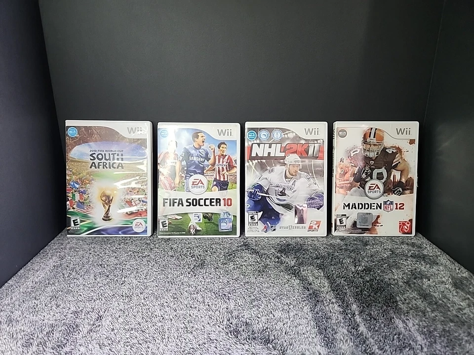 Lote de juegos deportivos Nintendo Wii - Copa Mundial de Fútbol FIFA Sudáfrica 2010, NHL 2k11 Foto 1 de 4