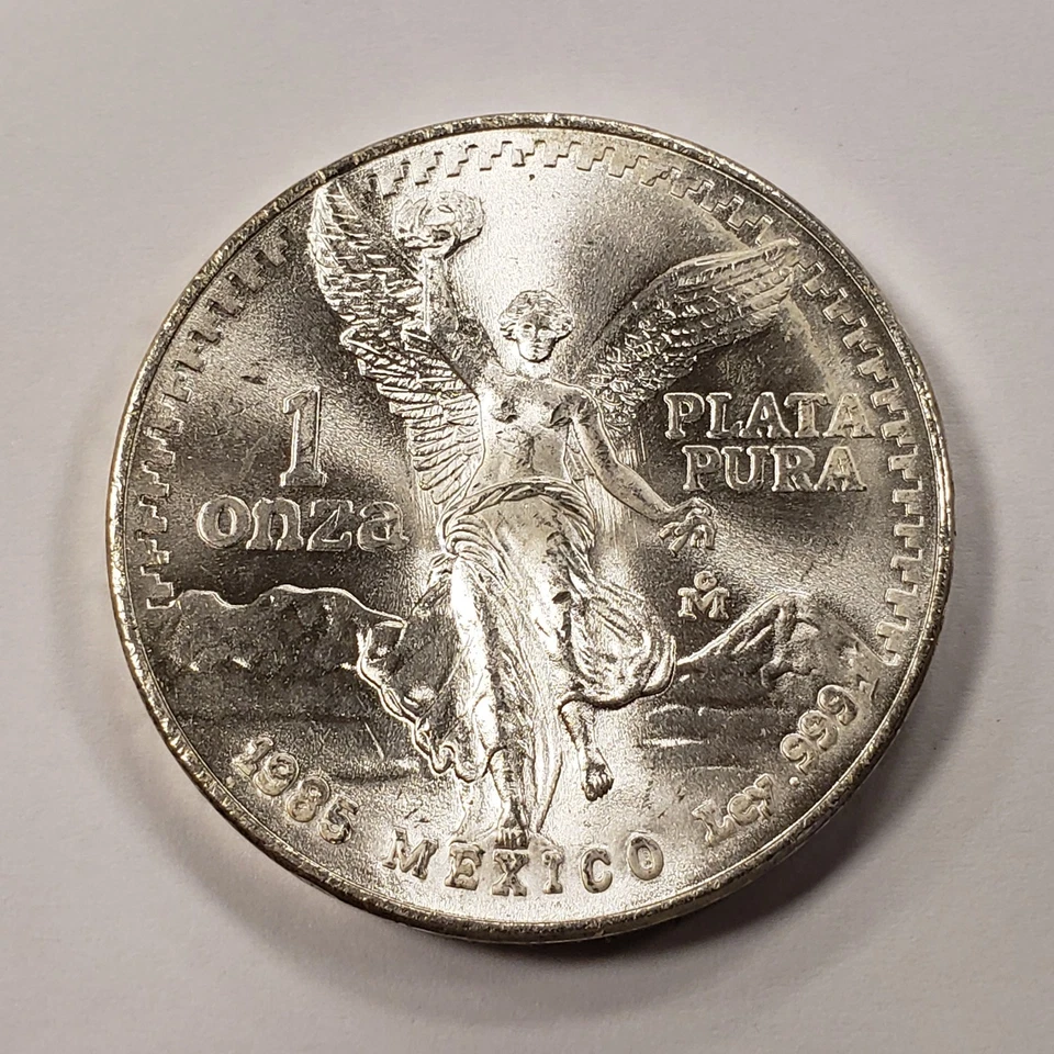 1985 Mo Mexico Libertad Onza 1 oz .999 Silver - Very Choice BU - SKU-Q2409.a - Image 1 of 4