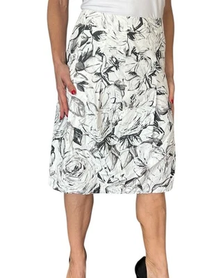 Falda para mujer Akris Punto 8 blanca negra floral algodón línea A plisada Foto 1 de 4