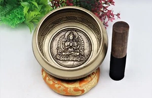 🌟 Serene Harmony: 5-Inch Hand-Beaten Singing Bowl with Carved Meditating Buddha - Picture 1 of 4