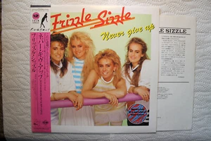 Frizzle Sizzle - Never Give Up Japanese orig' Canyon PRO 12" synth pop 1987 - Imagen 1 de 1