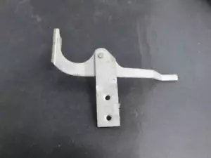 Left Front Door Lock Bracket 57 58 Plymouth Models NOS MOPAR 1775437 - Picture 1 of 6