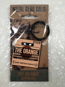 PORTE CLES (KEYCHAIN) METAL GEAR SOLID 2 THE ORANGE KEY RING (LIMITED TO 5000) N - Picture 1 of 2