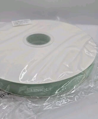 Clinique Green Holiday Ribbon White Letters 1 in Wide Gift Wrap Trim Beauty - Image 1 of 2