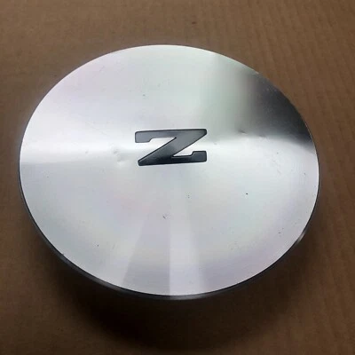 Cubierta de tapa central de rueda OEM 1984-1989 Nissan 300ZX 300 ZX Foto 1 de 4