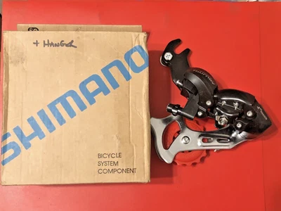 NEW OLD STOCK SHIMANO TOURNEY SIS REAR MECH RD-TX30,7 SPEED,BOXED + INSTRUCTIONS - Image 1 of 4