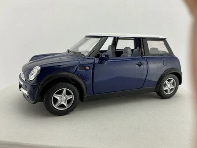 Kinsmart 5” Mini Cooper 1:28 Diecast Model Toy Car Dark Blue w/White Top - Image 1 of 4