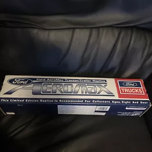 FORD AEROMAX TRACTOR/TRAILER REPLICA DIE CAST METAL 1:64 SCALE, TNT RED STAR - Picture 1 of 3