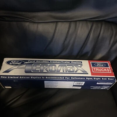 FORD AEROMAX TRACTOR/TRAILER REPLICA DIE CAST METAL 1:64 SCALE, TNT RED STAR  - Image 1 of 3