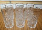 Set of 6 cut glass tumblers 6" tall with gold rim very heavy