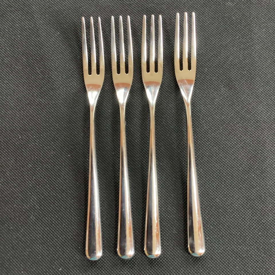 Juego de 4 tenedores de ensalada Alessi Inox Caccia cubiertos de acero inoxidable Inox 6 3/4" Foto 1 de 4