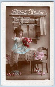 1920's RPPC BIRTHDAY HANDCOLORED GIRL BLUE DRESS DOLL FLOWERS TOP HAT POSTCARD - Picture 1 of 2