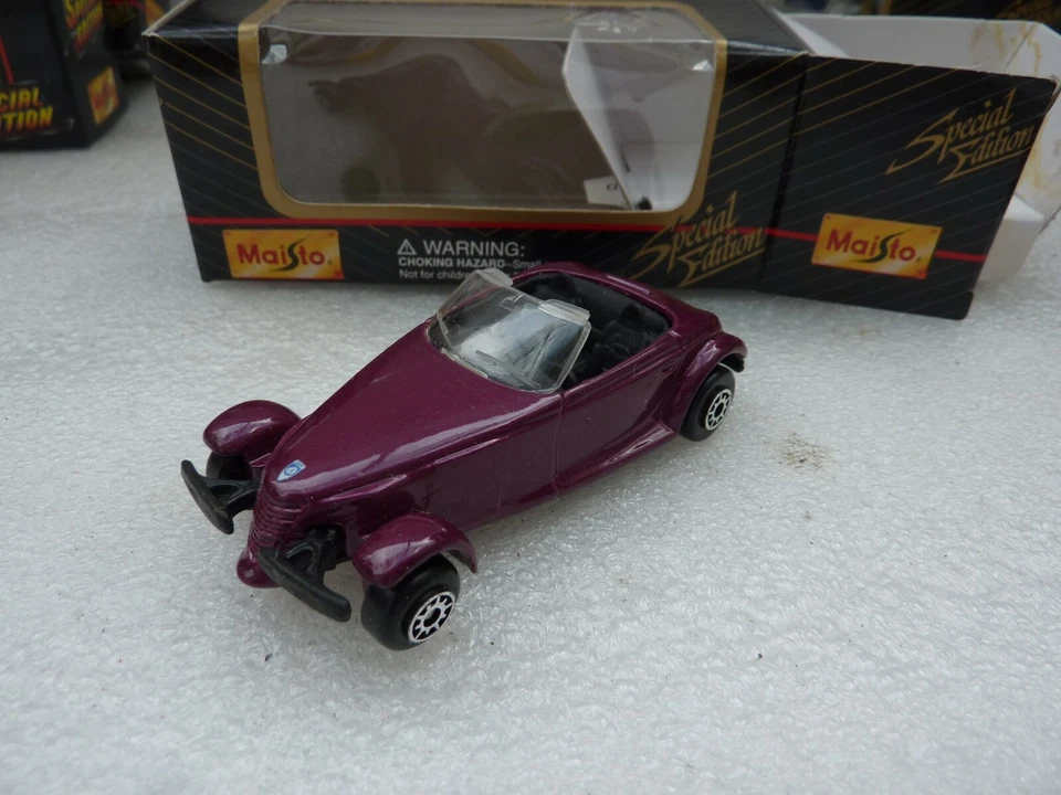 MAISTO ECH 1/64 ENVIRON PLYMOUTH FROWLER VIOLET METAL NEUF EN BOITE - Photo 1/1