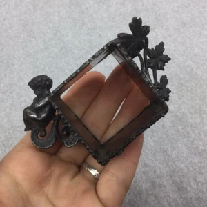 Anillo de servilleta antiguo Meriden Brittania querubín inusual forma cuadrada - Imagen 1 de 4