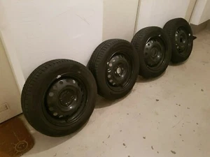 4- Loch Stahlfelge vom Nissan mit Sommerreifen (175 65 r15 84T) - Bild 1 von 12