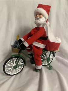 Mr. Christmas Iluminado Animado/Musical Ciclismo Papá Noel, Toca Villancicos - Imagen 1 de 5