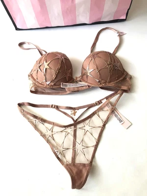 Victorias Secret Bombshell Add-2-Cups Sujetador y Tanga en V Conjunto de 2 Piezas Estrellas Oro Rosa Nuevo con Etiquetas Foto 1 de 4
