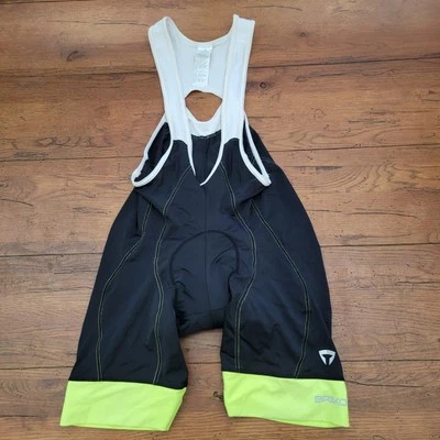 Culotte con tirantes de ciclismo Briko para mujer 7" 15" (8,5/10) vintage mediano grande negro neón Foto 1 de 4