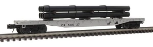 Atlas O Scale 52'6" Flatcar with Load (3-Rail) Conrail/CR (Gray/Black) #58543 - Picture 1 of 1