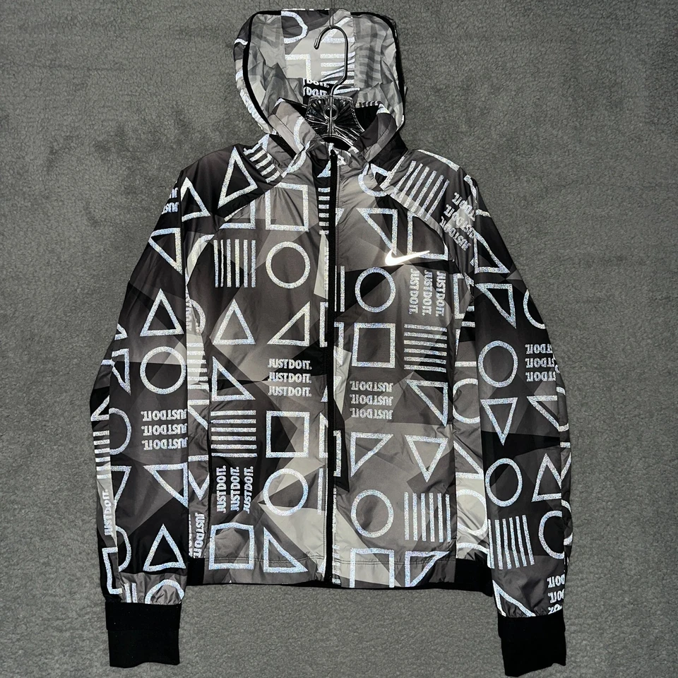 Jaqueta Nike Feminina Média M Cinza Reflexiva Escudo de Academia Flash Jaqueta de Corrida - Imagem 1 de 4