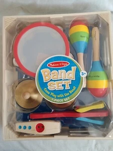 NEU - Melissa & Doug 7 Stk. Holzband Set in Box #9864 - Kazoo, Becken, Clapper - Bild 1 von 2