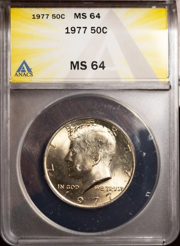 1977 50c Clad John F Kennedy Half MS 64 ANACS # 7351670 + Bonus Cover