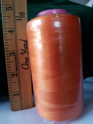 One Spool Orange Color High Quality Sewing Machine Serger Thread 6000 Yard Cone  - Image 1 of 4