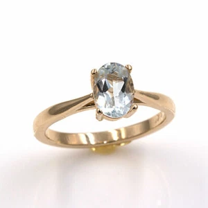 Natural White Topaz 14KT Yellow Gold 7x5mm Oval Ring (Sizes 4-9) - Picture 1 of 2