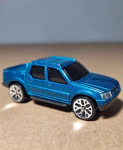 Maisto Ford Explorer Sport Trac, Druckguss blau 1:64 Pickup, China #3 - Bild 1 von 7