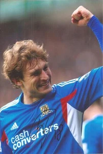 CASCO * FOTO DE ACCIÓN 6X4 FIRMADA POR NIKICA JELAVIC + CERTIFICADO DE AUTENTICIDAD - Imagen 1 de 1