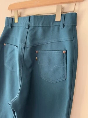 Pantalones de poliéster vintage años 70 Levi’s pierna ancha permanente verde azulado para mujer M 28” Foto 1 de 4