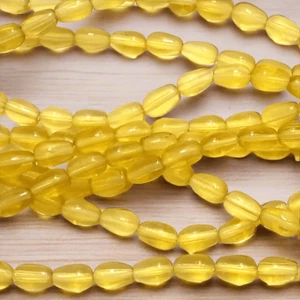5 Strings Glass Drop Beads Trans Yellow 6x4mm - Picture 1 of 8