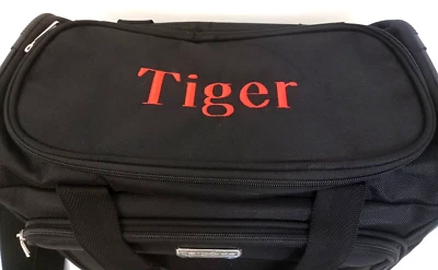 Bolsa de Lona Samsonite Equipaje de Mano Negra con Nombre Tiger Woods y Bolsa de Aseo Foto 1 de 4