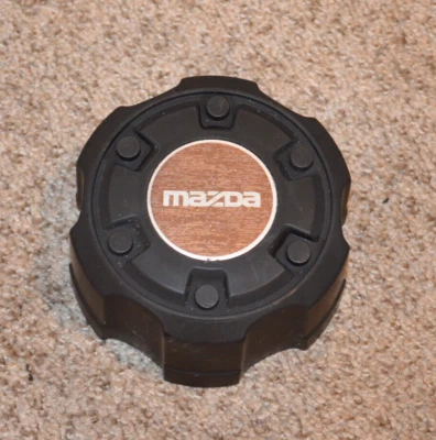 1986-1993 MAZDA B2200 B2600 WHEEL CENTER CAP HUB CAP OEM - Image 1 of 4