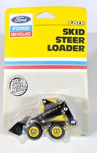 1/64 New Holland L555 Skid Steer Loader, New on card - Picture 1 of 4