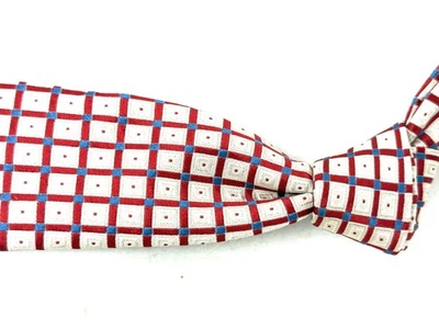 Corbata de seda Dolce & Gabbana etiqueta negra tejida roja champán azul intersección cubos sin precio base Foto 1 de 4