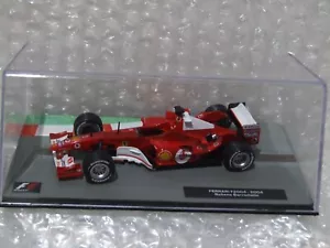 1:43 Scale 2004 Formula 1 Ferrari F2004 Rubens Barichello F1 - Picture 1 of 3