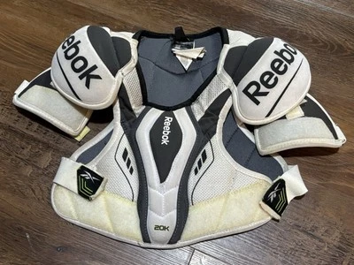 Hombreras Reebok 20K | Juvenil Grande Foto 1 de 3