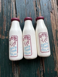 Pottery Barn Kids 3-teiliges Milchflaschen-Set aus Holz - Bild 1 von 7