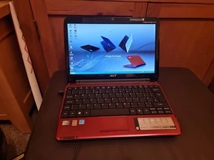 Acer AO751h-52Br Intel Atom® Z520 Netbook 11.6" 1 GB DDR2-SDRAM Windows XP Red - Picture 1 of 7