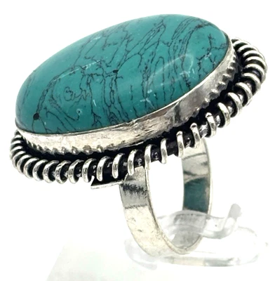 Large tribal-style silver-tone ring with turquoise cabochon – UK size U - Image 1 of 4