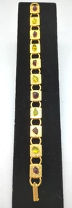 Vintage goldfarbenes Armband mit grünen Peridot und roten Granat ungeschliffenen Steinen - Bild 1 von 6